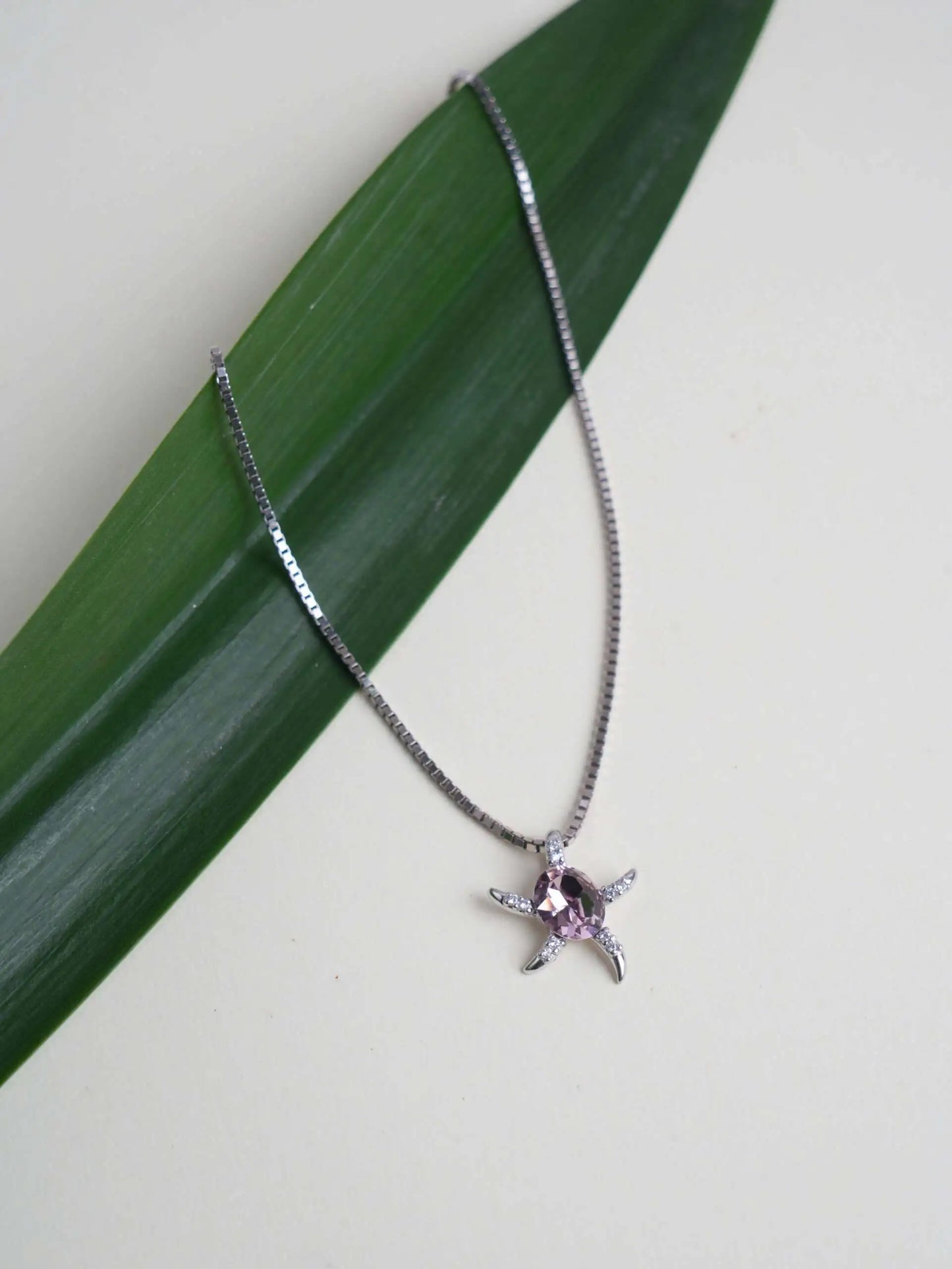 Previous Next Silver Turtle Pink Chain Pendant